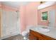 Bathroom with single vanity, mirror, and shower at 35 Pawn Dr, Carrollton, GA 30116