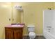 Cozy bathroom featuring a shower-tub, a toilet, and a vanity with a mirror at 35 Pawn Dr, Carrollton, GA 30116