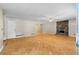 Spacious living room with parquet floors, stone fireplace, ceiling fan and natural light at 35 Pawn Dr, Carrollton, GA 30116