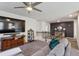 Stylish carpeted loft featuring comfortable seating and a large television at 6977 Demeter Dr, Atlanta, GA 30349