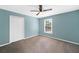 Bedroom with carpet flooring, a window and a closet space at 8035 Canter Ln, Alpharetta, GA 30009