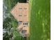 Charming brick two-story home with arched window and lush green lawn at 8035 Canter Ln, Alpharetta, GA 30009