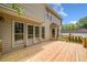 Exterior shot showing a large wooden deck with access to the house through sliding glass doors at , Marietta, GA 30064