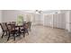 Finished basement area featuring tile floor, dining set, and double closets at , Marietta, GA 30064