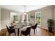 Elegant dining room with table setting, hardwood floors, and natural light at , Marietta, GA 30064