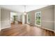 Dining room with hardwood floors, chandelier, and large windows at , Marietta, GA 30064