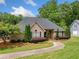 Charming single-story home with manicured landscaping and a curved walkway at , Marietta, GA 30064