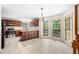 Bright kitchen features tile floor, center island, stainless steel appliances, and windows offering outdoor views at , Marietta, GA 30064