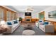 Cozy living room with fireplace, sofas, hardwood floors, and natural light at , Marietta, GA 30064