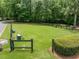Neighborhood showing a large grassy field bordered by a black fence at , Marietta, GA 30064