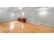 Spacious basement area with hardwood floors, recessed lighting, and walkout access to the backyard at 130 Robin Rd, Marietta, GA 30067