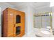Bathroom featuring a sauna, a glass-enclosed shower, granite counters, and tile flooring at 130 Robin Rd, Marietta, GA 30067