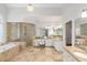 Expansive bathroom with a soaking tub, walk-in shower, and granite countertops at 130 Robin Rd, Marietta, GA 30067