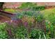 Beautiful flower garden filled with colorful flowers and greenery in a well-maintained landscape at 130 Robin Rd, Marietta, GA 30067
