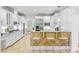 Contemporary kitchen featuring stainless appliances, a breakfast bar, and ample counter space at 130 Robin Rd, Marietta, GA 30067