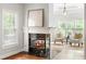 Cozy living room with marble fireplace and a pair of chairs at 130 Robin Rd, Marietta, GA 30067