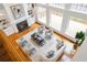 Spacious living room featuring a fireplace, large windows, and hardwood floors at 130 Robin Rd, Marietta, GA 30067