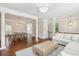 Spacious living room featuring hardwood floors, open space, and views to the dining room at 3694 Lambert Ne Ln, Atlanta, GA 30319