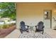 Covered patio with seating and outdoor rug at 3694 Lambert Ne Ln, Atlanta, GA 30319