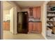 Functional kitchenette with updated cabinets and appliances in the basement at 103 Old Avery Dr, Canton, GA 30115