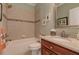 Cozy bathroom featuring a tub, shower, and a single vanity with granite countertop at 103 Old Avery Dr, Canton, GA 30115