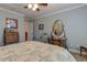 Charming bedroom with a bed, dresser, and tasteful decor, creating a relaxing retreat at 103 Old Avery Dr, Canton, GA 30115