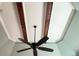 A tray ceiling with dark wooden beams and a modern fan adds architectural interest to this room at 103 Old Avery Dr, Canton, GA 30115