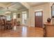 Formal dining room showcasing a chandelier, wainscoting, and light green colored walls at 103 Old Avery Dr, Canton, GA 30115