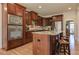 Stylish kitchen featuring granite countertops, stainless steel appliances, and custom cabinetry at 103 Old Avery Dr, Canton, GA 30115