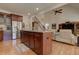 Open kitchen view with stainless appliances, a center island, and seamless access to living areas at 103 Old Avery Dr, Canton, GA 30115