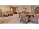 Comfortable living room features plush seating, a game table, and a convenient kitchenette at 103 Old Avery Dr, Canton, GA 30115