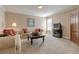 Inviting living room provides a cozy space for relaxation and entertainment at 103 Old Avery Dr, Canton, GA 30115