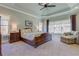 Spacious main bedroom with tray ceilings, sitting area, and large windows at 103 Old Avery Dr, Canton, GA 30115