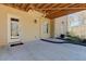 Covered patio showcasing a door and exterior lighting fixtures at 103 Old Avery Dr, Canton, GA 30115