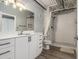 Bright bathroom featuring a white vanity, toilet, and subway tiled shower with glass door at 195 Arizona Ave # 179, Atlanta, GA 30307