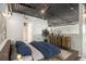 Modern primary bedroom with a large bed, sleek dresser, and ample natural light through large windows at 195 Arizona Ave # 179, Atlanta, GA 30307