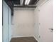 Walk-in closet with wire shelving on the walls and industrial-style exposed ductwork at 195 Arizona Ave # 179, Atlanta, GA 30307