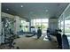 Well-equipped fitness center with treadmills, weights, machines, and floor-to-ceiling windows at 195 Arizona Ave # 179, Atlanta, GA 30307
