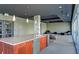 A communal kitchen area features granite countertops, stainless appliances and leads to a cozy seating area at 195 Arizona Ave # 179, Atlanta, GA 30307