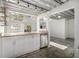 Contemporary kitchen with granite countertops, stainless appliances, and ample natural light at 195 Arizona Ave # 179, Atlanta, GA 30307