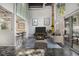 Bright living room with high ceilings, modern furnishings, and sliding glass doors to the outside at 195 Arizona Ave # 179, Atlanta, GA 30307