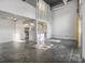 Bright open-concept living space with polished concrete floors and modern kitchen, perfect for entertaining at 195 Arizona Ave # 179, Atlanta, GA 30307