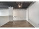 Spacious loft area with hardwood floors, metal ceiling and ample natural light at 195 Arizona Ave # 179, Atlanta, GA 30307