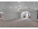 Large bonus room with ceiling fan, recessed lighting, plush carpet, and vaulted ceilings at 541 Glen Abbey Se Cir, Mableton, GA 30126