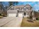 Charming two-story home with a three-car garage and well-maintained landscaping at 541 Glen Abbey Se Cir, Mableton, GA 30126