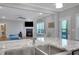 Open kitchen features stainless steel appliances, a center island, and a view of the living room at 541 Glen Abbey Se Cir, Mableton, GA 30126