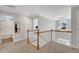 Second floor landing with staircase and views into other rooms at 541 Glen Abbey Se Cir, Mableton, GA 30126