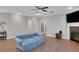 Cozy living room showing a fireplace, hardwood flooring, and comfortable seating at 541 Glen Abbey Se Cir, Mableton, GA 30126