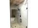 Modern shower with rain head, handheld head, glass surround and pebble floor at 541 Glen Abbey Se Cir, Mableton, GA 30126