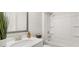 Bathroom with a shower and tub combination at 64 Lakeview Pt, Dallas, GA 30157
